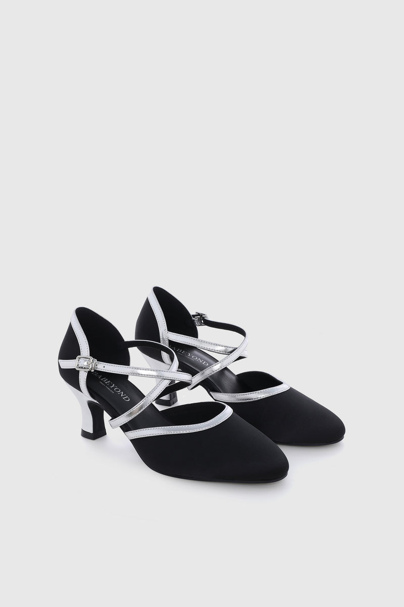a pair of black closed-toe Latin dance shoes with silver-white straps and heels