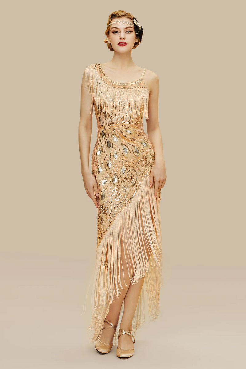 a blonde wearing a fringed mini dress with one-shoulder strap and an asymmetrical fringed hemline