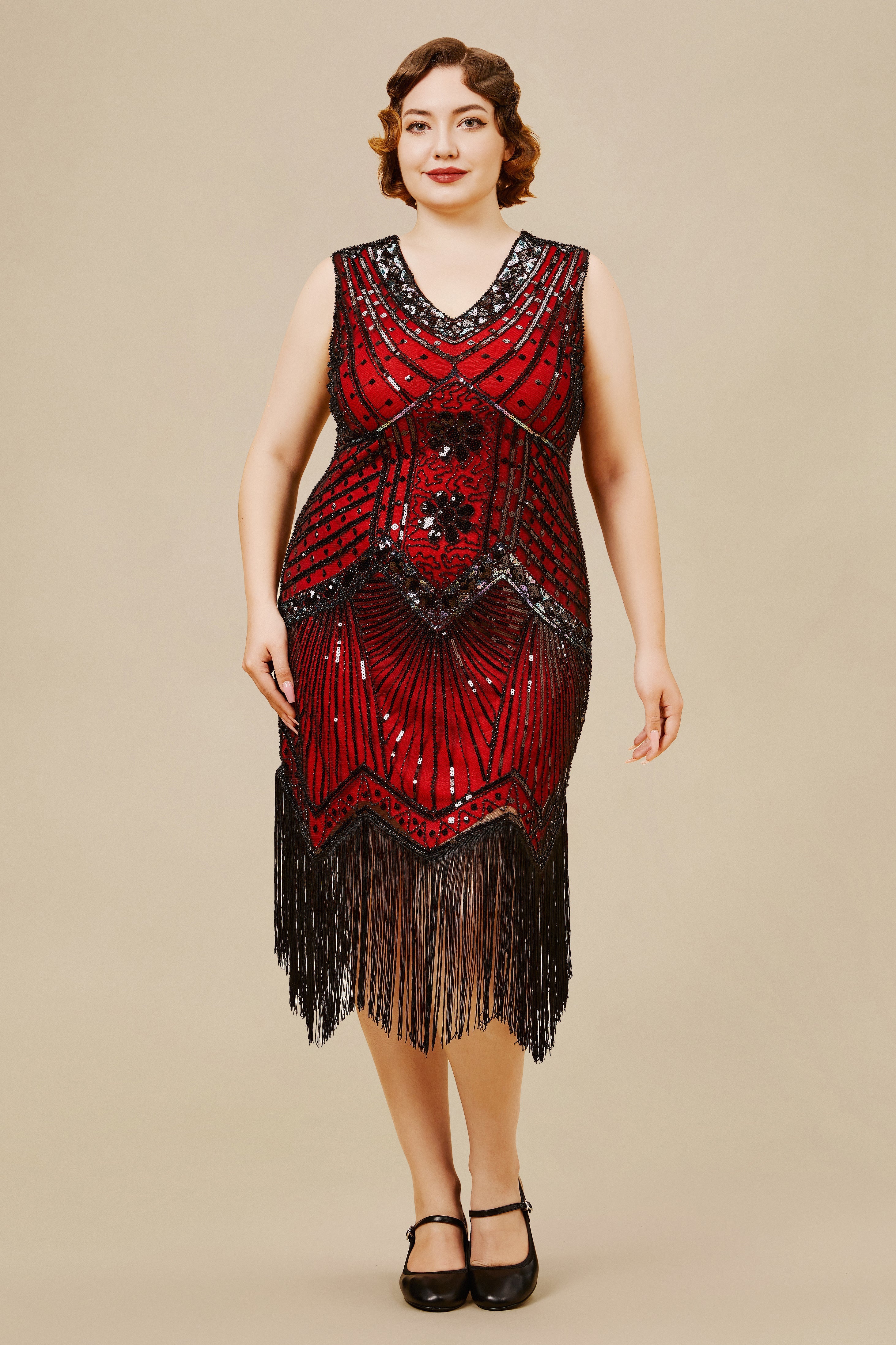 a woman wearing a plus-size sleeveless Art Deco Flapper dress
