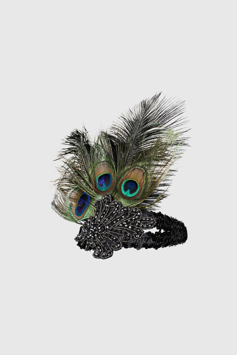 a headpiece adorned with peacock feathers, sequins and beads